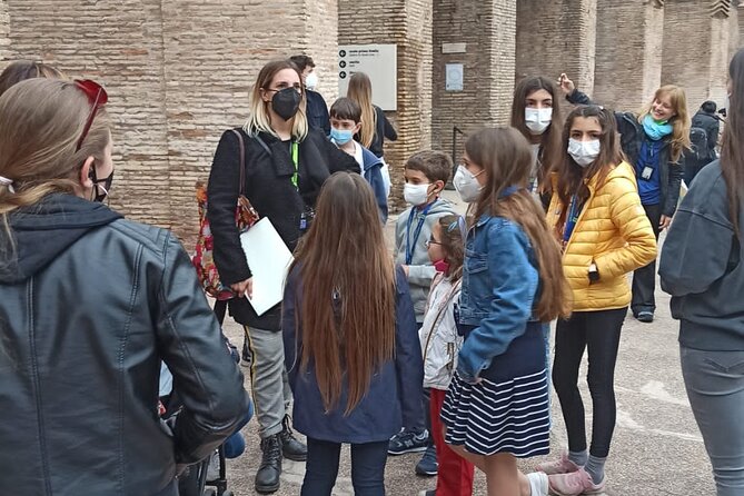 Private Colosseum, Roman Forum & Palatine Hill Guided Tour - Walking through the Roman Forum with Expert Commentary