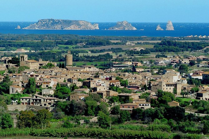 Private Costa Brava and Empuries Tour with Hotel Pick-Up and Panoramic Boat Ride - Discovering Sant Martí dEmpúries: Medieval Charm