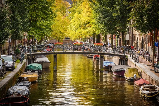 Private departure transfer from Amsterdam to Schiphol Airport (AMS) - The Comforts of a Private Vehicle with WiFi and Water