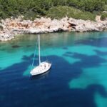 Private sailing experience in Alghero - Admiring Punta Giglio from the Water