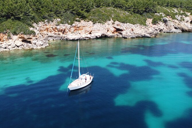 Private sailing experience in Alghero - Admiring Punta Giglio from the Water