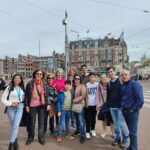 Private tour of Amsterdam with Portuguese-speaking guide - Visiting Dam Square and Learning About Amsterdam’s History