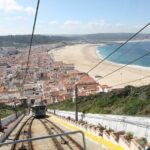 Private Tour to Nazaré and Alcobaça, giant waves and a monastery - Exploring Nazaré’s Traditional Fish Market and Coastal Charm