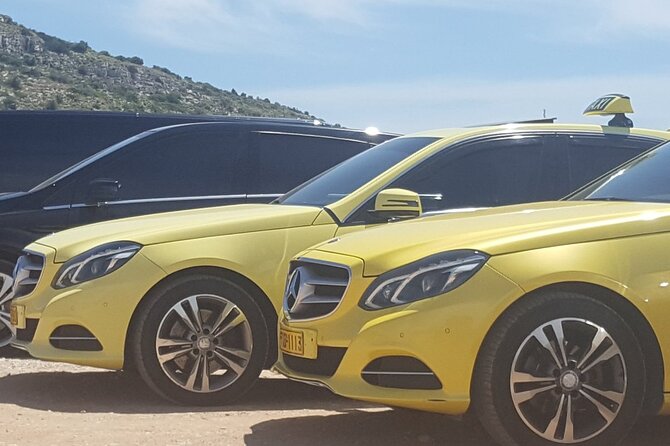 Private Transfer from Piraeus Port to Athens City - Comfortable, Air-Conditioned Vehicles with Wi-Fi and Water