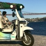 Private tuk tuk tour in old city Lisbon (Standard-1h30) - Passing Through Rossio Square’s Vibrant Atmosphere