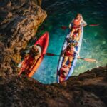 Pula: Glow Kayak Night Tour - Cave and Underwater World - Visiting Bua Cave: Light, Sound, and Reflection