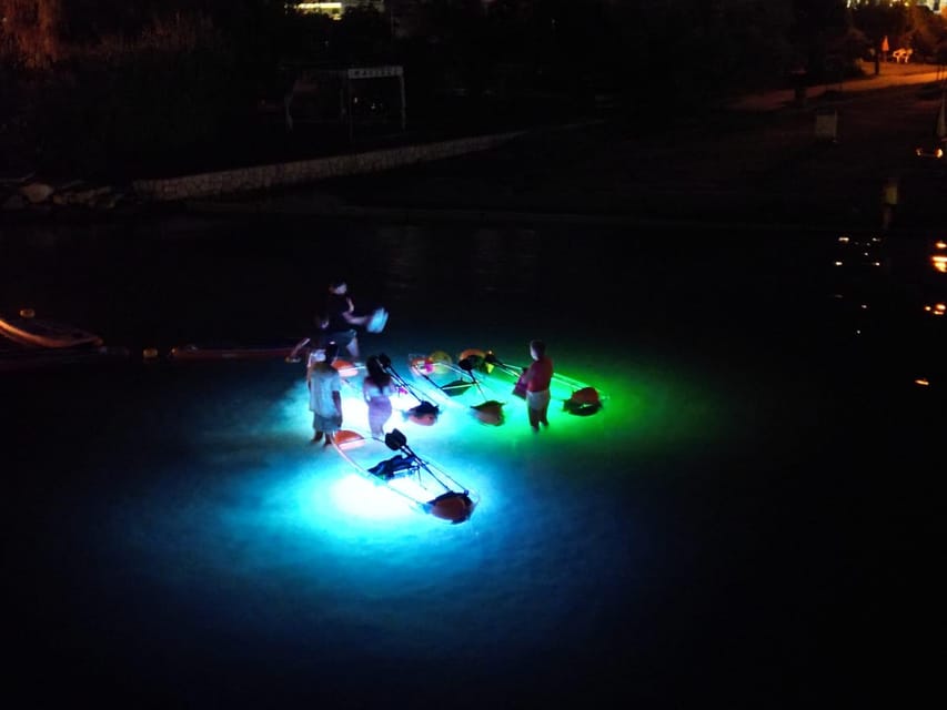 Rab: Night adventures illuminated transparent kayaks - The Setting of Lopars Sandy Beach Mel for Night Kayaking