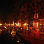 Red Light District tour with canal cruise - The Historic Buildings of the Old Town and the Dam