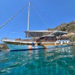 Rhodes: Bay to Bay, Including Drinks and BBQ - Ladiko Bay: Swimming, Snorkeling, and Greek BBQ