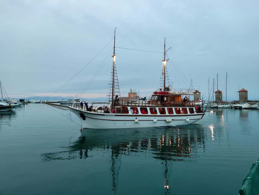 Rhodes: Sunset cruise, swimming stop, snaks & Drinks - Setting Sail on a Traditional Gulet for Scenic Coastline Views
