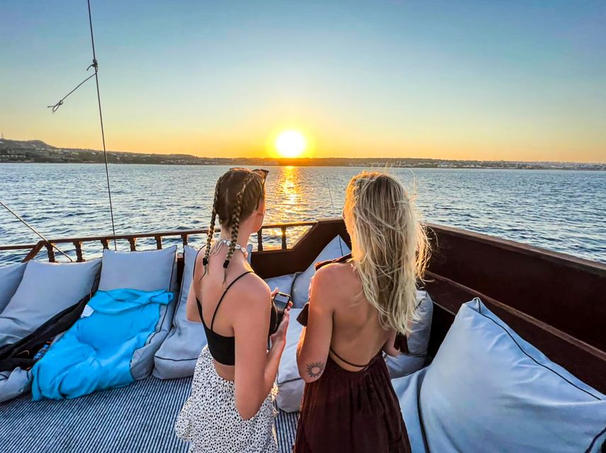 Rhodes: Sunset Cruise with Greek BBQ and Unlimited Drinks - Rhythmic Scenic Voyage with a Guide