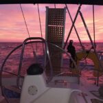 Romantic Sunset Cruise in Kissamos: Music, Wine, Giving Back - Witness the Sunset Behind the Cretan Mountains