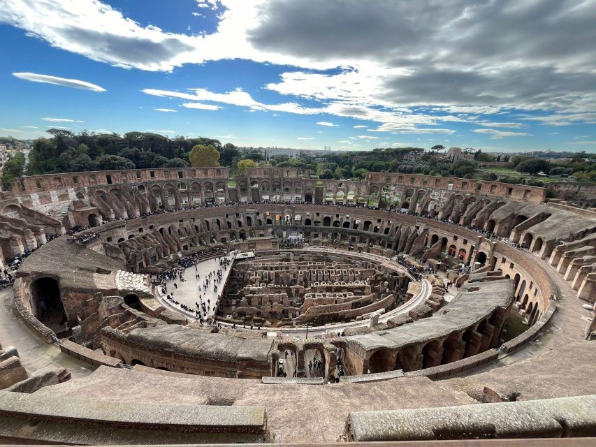 Rome: Colosseum and Ancient Rome Guided Walking Tour - Walking Through the Roman Forum