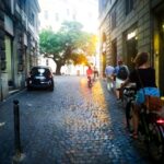 Rome :guided night e-bike tour with typical ice-cream - Crossing the Tiber River into Trastevere