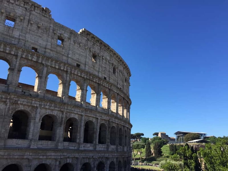 Rome: Mamertine Prison, Colosseum Experience, & Audio Guide - How the Audio Guides Enhance the Colosseum and Surroundings