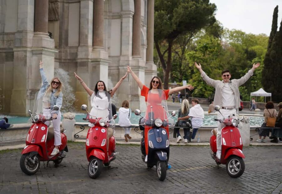 Rome: Photography service by Vespa Scooter - Exploring the Landmark of the Colosseum