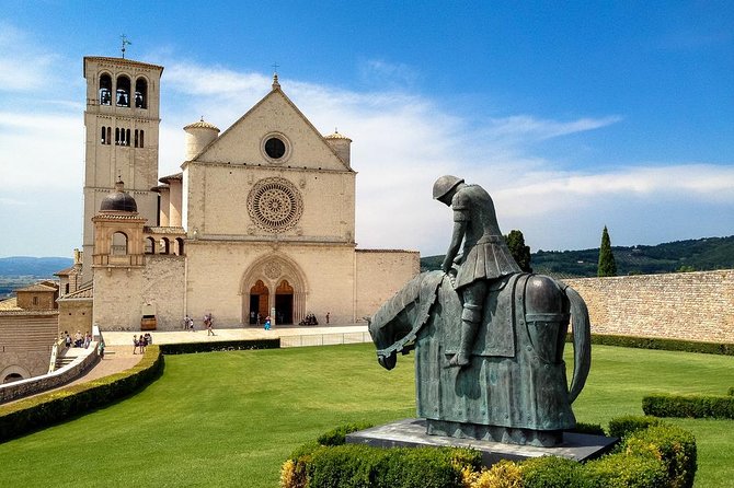 Rome to Florence luxury transfer with Orvieto & Assisi tour and light lunch - Indulging in a Traditional Italian Lunch and Wine Tasting