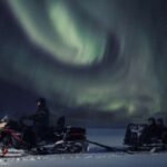 Ruka: Starlight sledging to search for Northern Lights - Riding in Sledges Pulled by Snowmobiles into Deep Forests