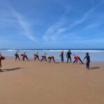 Sabura Surf Lessons & Rentals: F. da Telha Beach near Lisbon - F. da Telha Beach: The Perfect Setting for Surf Lessons