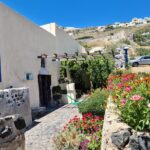 Sanotini Oia Wine Tasting and Local Places Half Day Tour - Visiting the Koutsogianopoulos Wine Museum: An Underground Wine Adventure