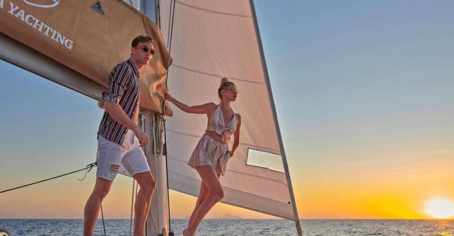 Santorini Gold Catamaran Cruise with Snorkel, BBQ & Open Bar - Exploring Santorini’s Colorful Beaches and Rock Formations