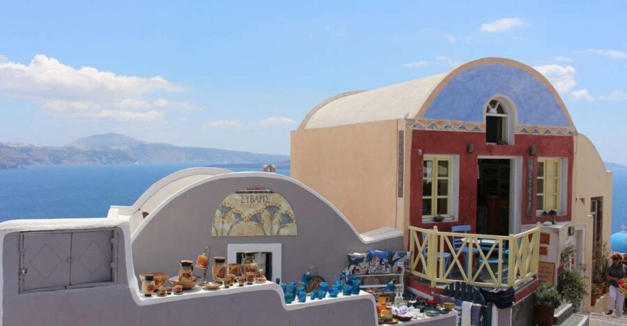 Santorini Island Bus Tour and Caldera Sunset Cruise - Exploring the Charming Village of Pyrgos