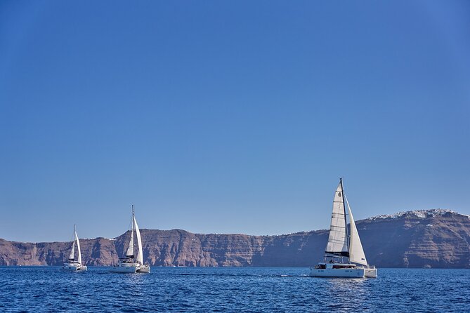 Santorini Oia: Caldera Luxury Day Cruise with BBQ & Drinks - Santorinis Caldera and Volcanic Landscape from the Water