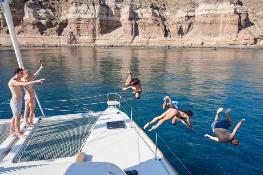 Santorini: Platinum Catamaran Cruise w/ BBQ Meal & Open Bar - Exploring Santorini’s Unique Beach Stops and Hot Springs