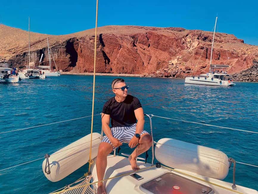 Santorini: Private Caldera Cruise with Lunch & Snorkeling - Discovering the Red Beach, Swimming, and Snorkeling in Santorini