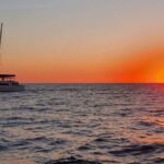 Santorini Private Catamaran Cruise with BBQ, Open Bar & Transfers - White Beach: Exclusive Access and Crystal-Clear Waters