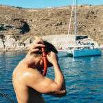 Santorini: Private Catamaran Tour with BBQ Meal and Drinks - Navigating Santorini’s Iconic Coastline