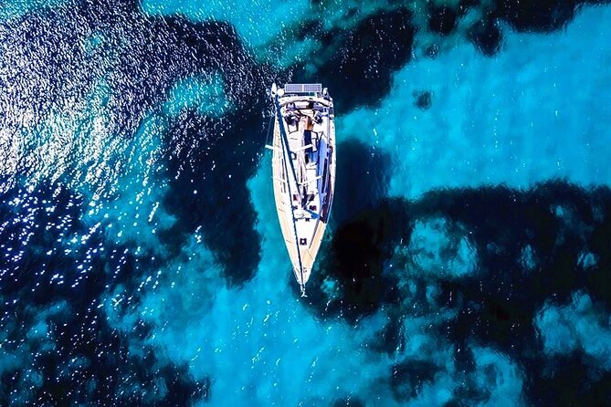 Santorini Sailsational: The Ultimate Caldera Sunset Cruise - Scenic Stops at Red Beach and White Beach