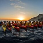 Santorini: Sunset Sea Kayak with Light Dinner - Exploring the White, Black, and Red Beaches
