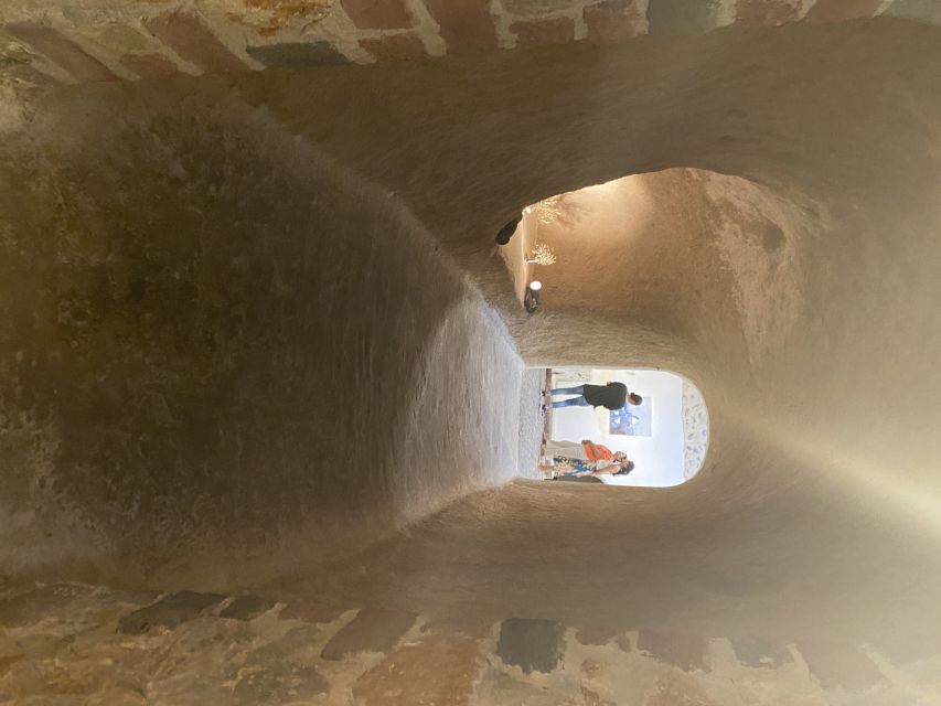 Santorini: Wine Tasting and Cave Settlement Tour - The Charm of a Traditional Cave Settlement