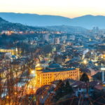Sarajevo: Nighttime City Highlights Walking Tour - Exploring Sarajevo’s Most Famous Landmark: Latin Bridge