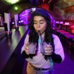 Saturday Night Pub Crawl for Professionals in Vienna, Austria - Exploring the Glow in the Dark Atmosphere at Daiquiri Shotothek