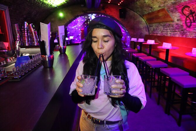 Saturday Night Pub Crawl for Professionals in Vienna, Austria - Exploring the Glow in the Dark Atmosphere at Daiquiri Shotothek