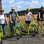 Scooter downhill tour from Dínský Snník - The Scenic Ascent to Mt. Snník and Its Panoramic Views