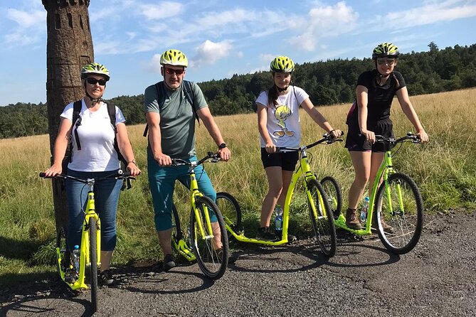 Scooter downhill tour from Dínský Snník - The Scenic Ascent to Mt. Snník and Its Panoramic Views