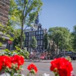 Secrets of Amsterdam Walking Tour plus Dutch Sweets Tasting - Unique Highlights Include Dutch Sweets and Port Wine Tasting