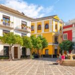 Seville: Barrio de Santa Cruz Small Group Walking Tour - Meeting Point in Plaza del Triunfo