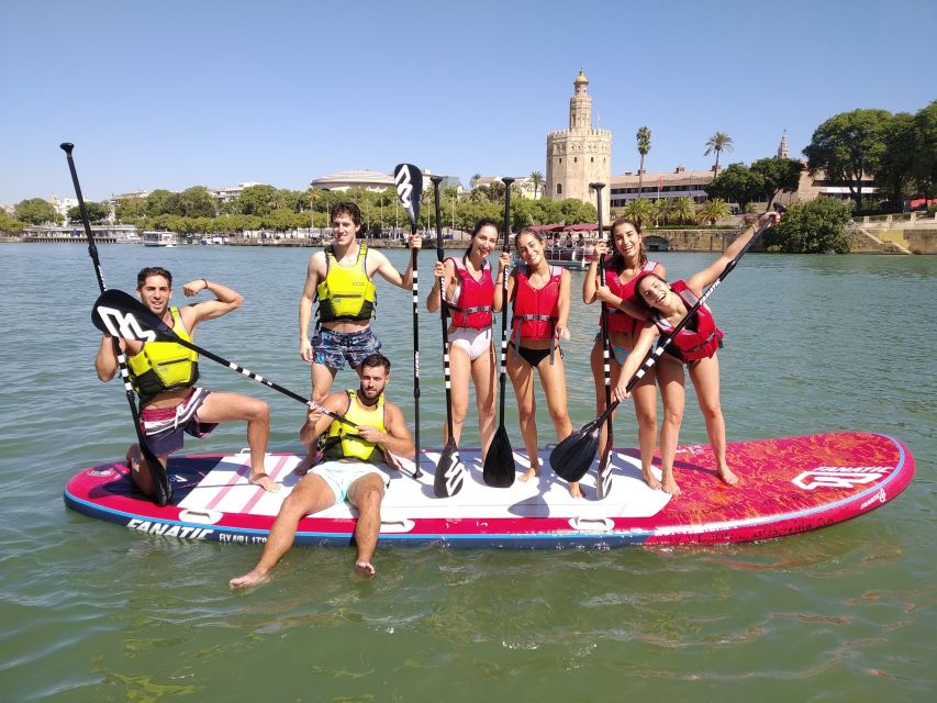 Seville: Group Giant Paddle-Boarding Session - Starting Point in Triana at Calle Betis
