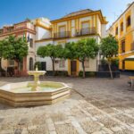 Seville: Relaxing City Bike Tour with a Tour Guide - Cycling Through Jardines de Murillo and Parque de María Luisa