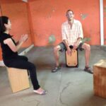 Seville: Rhythm, Beat and the Flamenco Box Drum - Meeting Point and Group Size Dynamics
