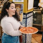 Seville: Triana Neighborhood Evening Tapas Tour - Visiting Los Especiales: A Family-Run Tapas Bar Since 1930