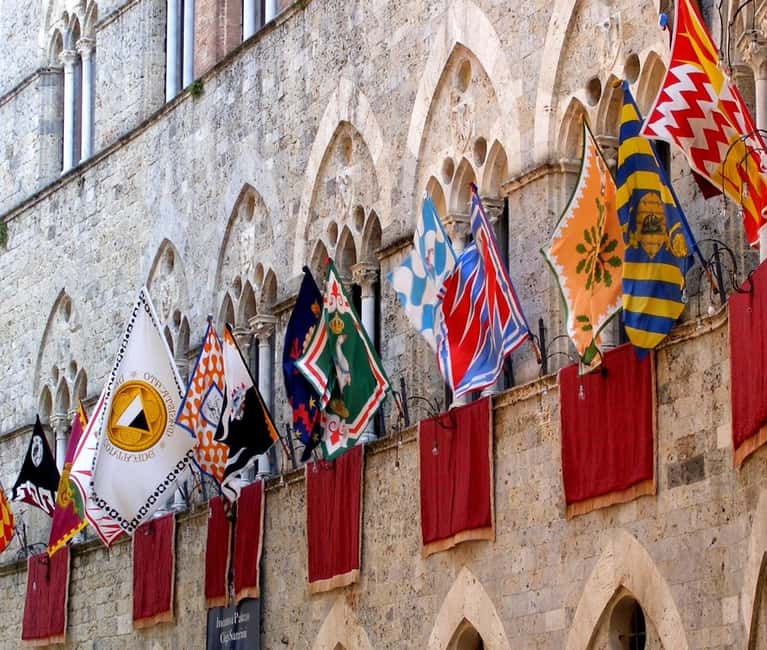 Siena: Contrade Walking Tour with Contrada Museum Entry - Exploring Sienas Contrade Neighborhoods