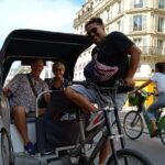 Sightseeing tour of most iconic parisian monuments (rickshaw) - Shopping and Strolling Along the Champs-Elysees