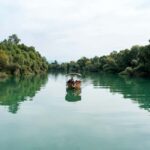 Skadar Lake Guided Tour to Vranjina Monastery & Wine Tasting - Traditional Wooden Boat Cruise through Lake Skadar’s Narrow Channels