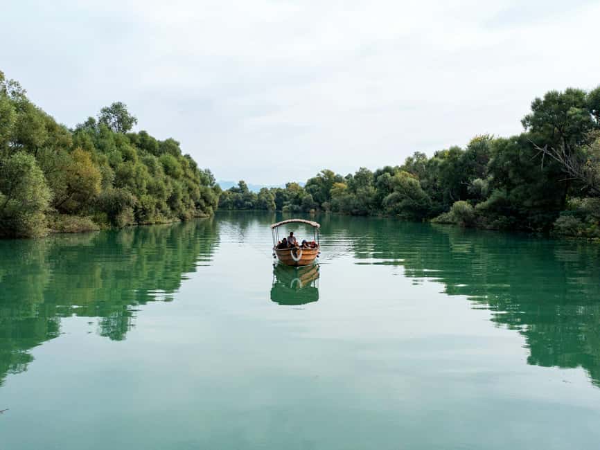 Skadar Lake Guided Tour to Vranjina Monastery & Wine Tasting - Traditional Wooden Boat Cruise through Lake Skadar’s Narrow Channels