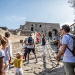 Skip-the-Line Pompeii Guided Tour from Naples - Walking Along Via dell’Abbondanza, Pompeiis Main Street